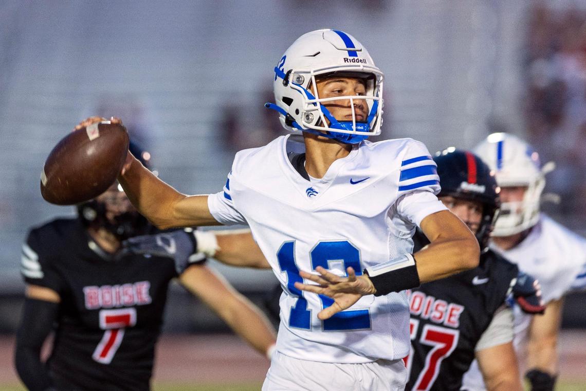 Timberline quarterback Austin Rovig winds up for a pass Aug. 18 against Boise. The Wolves will try to end their 20-game losing streak against Capital on Friday at Dona Larsen Park.