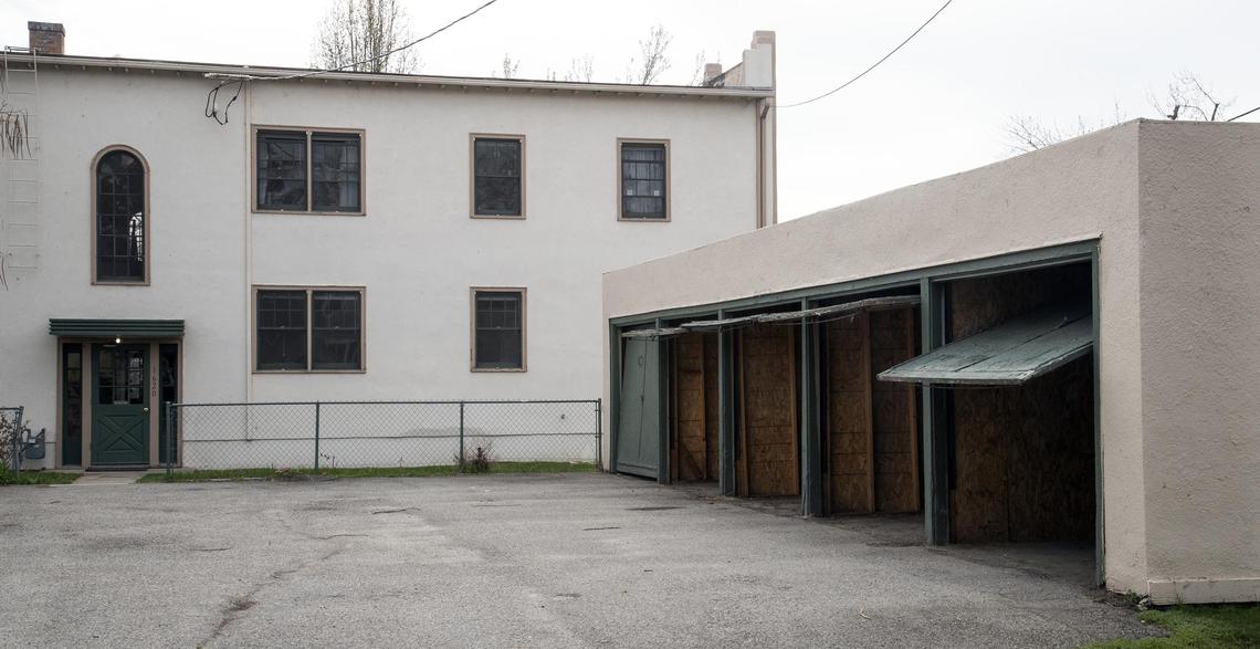 At the time of its construction in 1937, the Travis Apartments offered modern conveniences that were relatively uncommon, like a parking garage for each of its ten apartments.