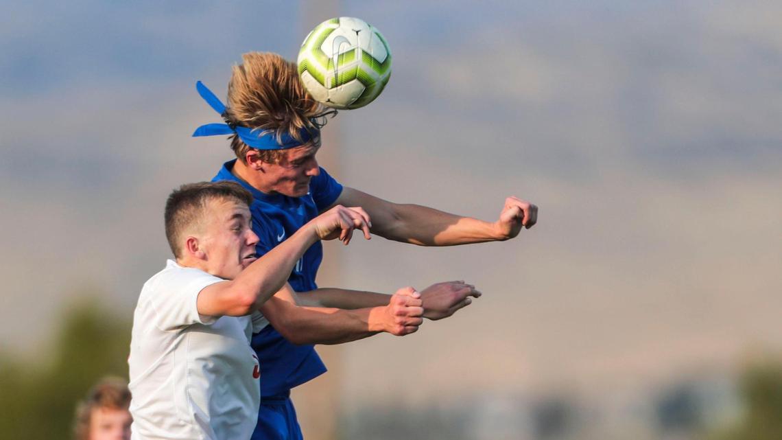 Timberline forward Zayne Davis gets the header over Boise’s Tucker Smith last season. Both are key returners for their teams as they enter the 2022 season.