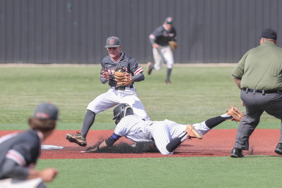 Owyhee second baseman Keegan Kelly rushes to the bag for an out Saturday against Rocky Mountain in the 5A state championship at Wolfe Field in Caldwell.