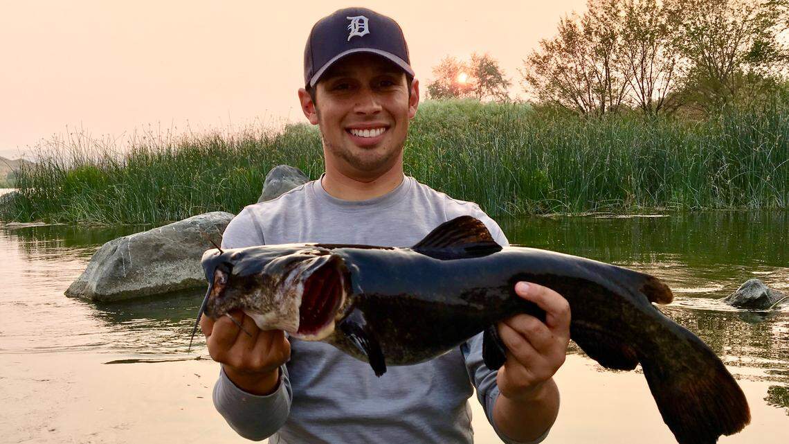 At any moment, a big fish might choose to attack your lure. If you tie good knots and stay ready, you might land a pleasant surprise like this Snake River flathead catfish.