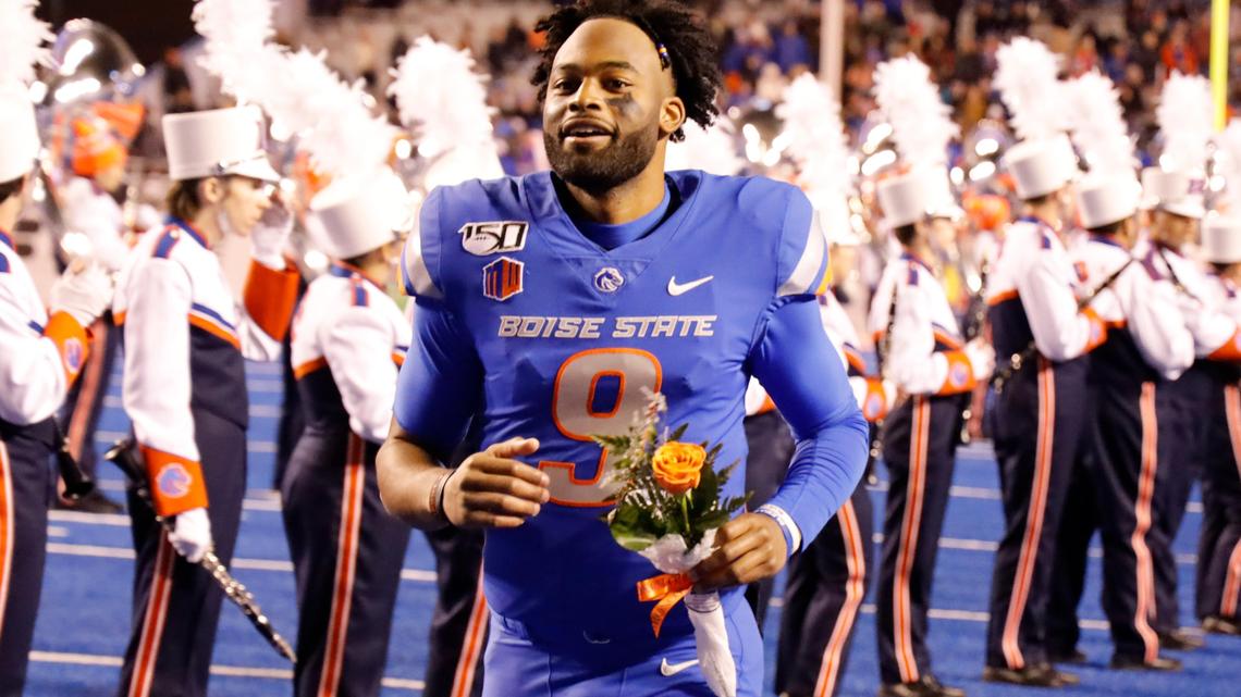 Boise State quarterback Jaylon Henderson runs onto the field during senior day before the game against New Mexico on Saturday at Albertsons Stadium.
