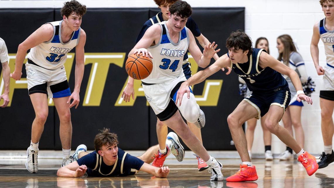 Timberline junior Jacob Heyne steals the ball from Middleton in the 5A District Three boys basketball semifinals Saturday at Capital High School.