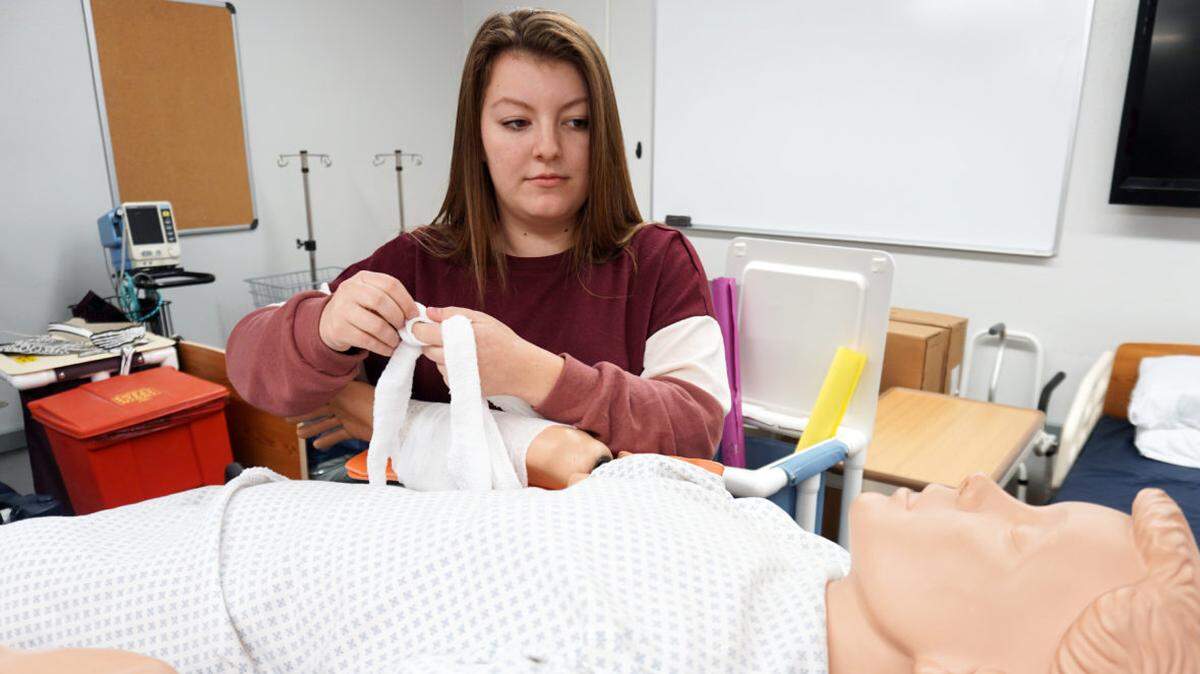 Holly Youngberg is taking dual-credit college level courses, but also career-technical classes. She hopes to enter college with credits in hand, and mobile job skills to help cover college costs.
