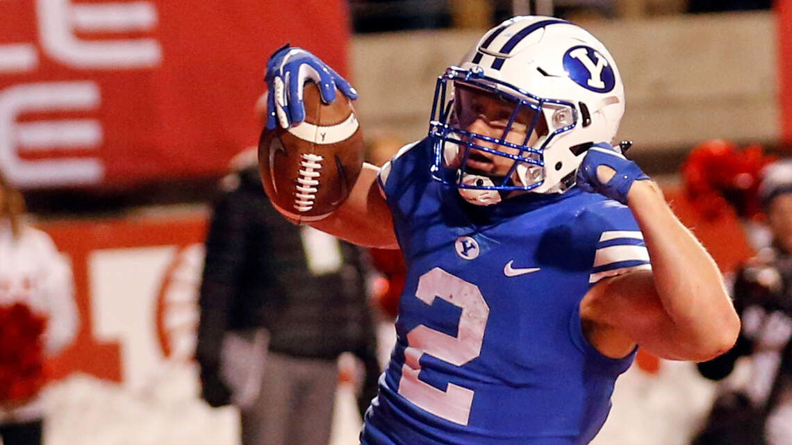 Wait, BYU is favored to win the Famous Idaho Potato Bowl by how much?