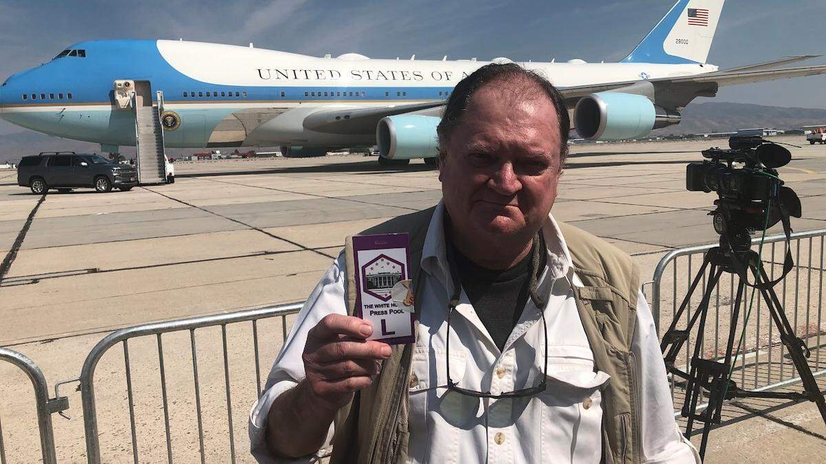 Longtime Boise journalist Scott Logan, seen here covering President Joe Biden’s visit to Boise last year, reflects on a career of “big” stories that he’s covered.