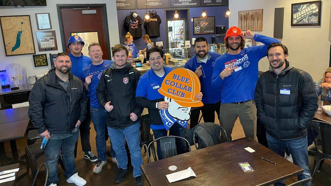 Members of Boise State’s Blue Collar Club gather at Paddles Up Poke in downtown Boise earlier this month. The club has about 90 members and has raised about $15,000 this year to fund scholarships for athletes.