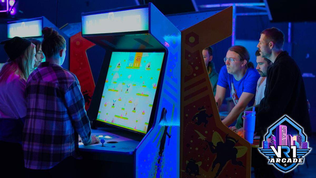 Guests play games on multiplayer arcade cabinets called “Killer Queens” in a photograph provided by VR1 Arcade.