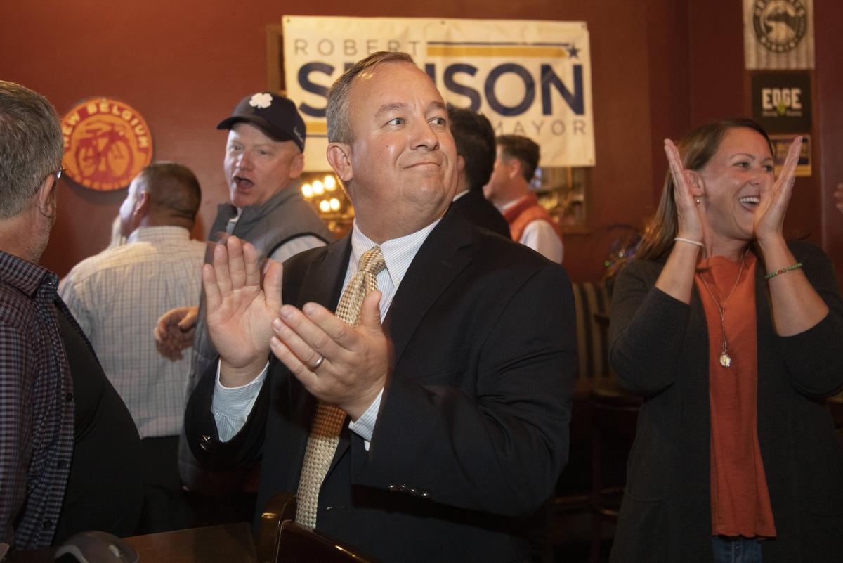 Robert Simison, mayor-elect of Meridian, celebrates with his supporters as the results confirm his win.