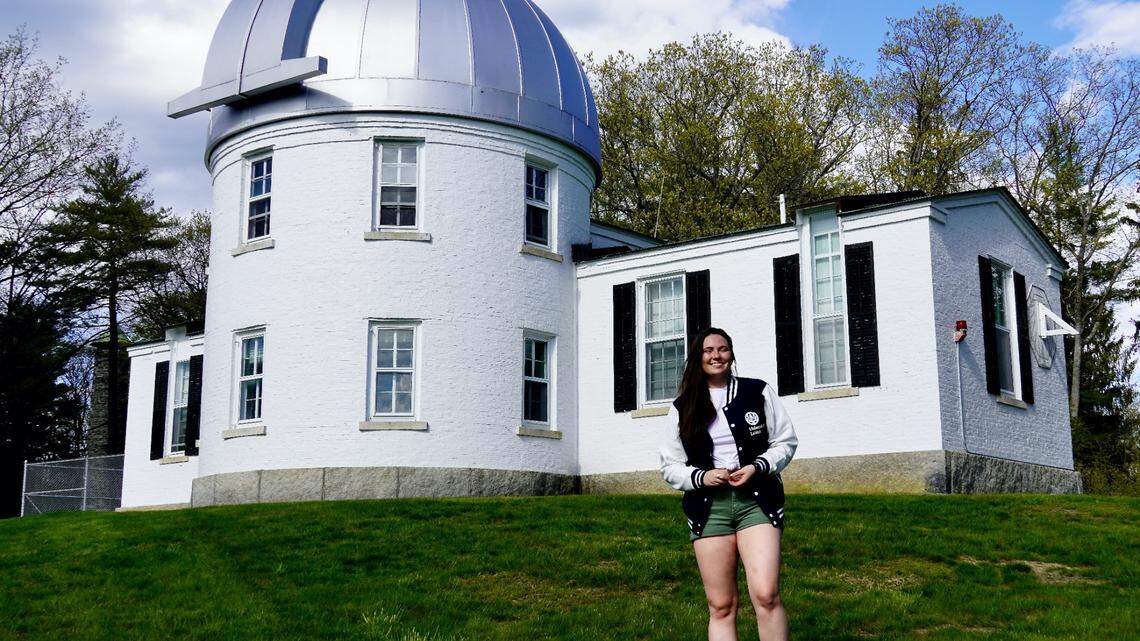 Catherine Slaughter stands in front of an observatory at Leiden University in the Netherlands.