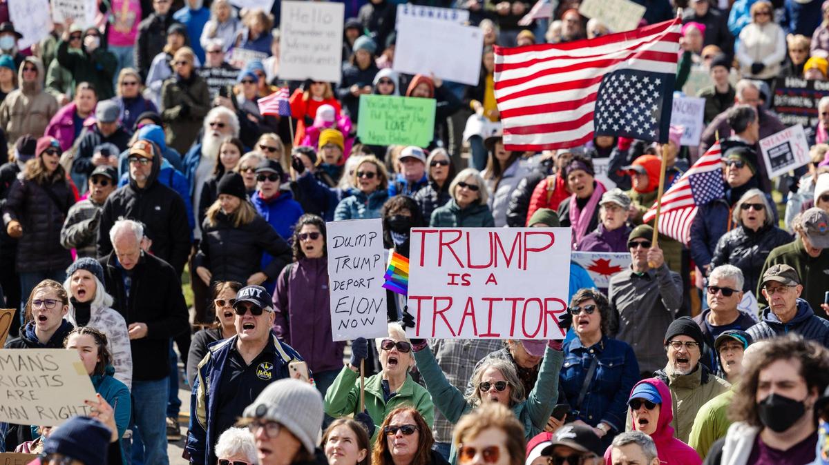 People gather at the Idaho Capitol in downtown Boise to rally against government officials including Idaho politicians and President Donald Trump, Saturday, March 15, 2025.