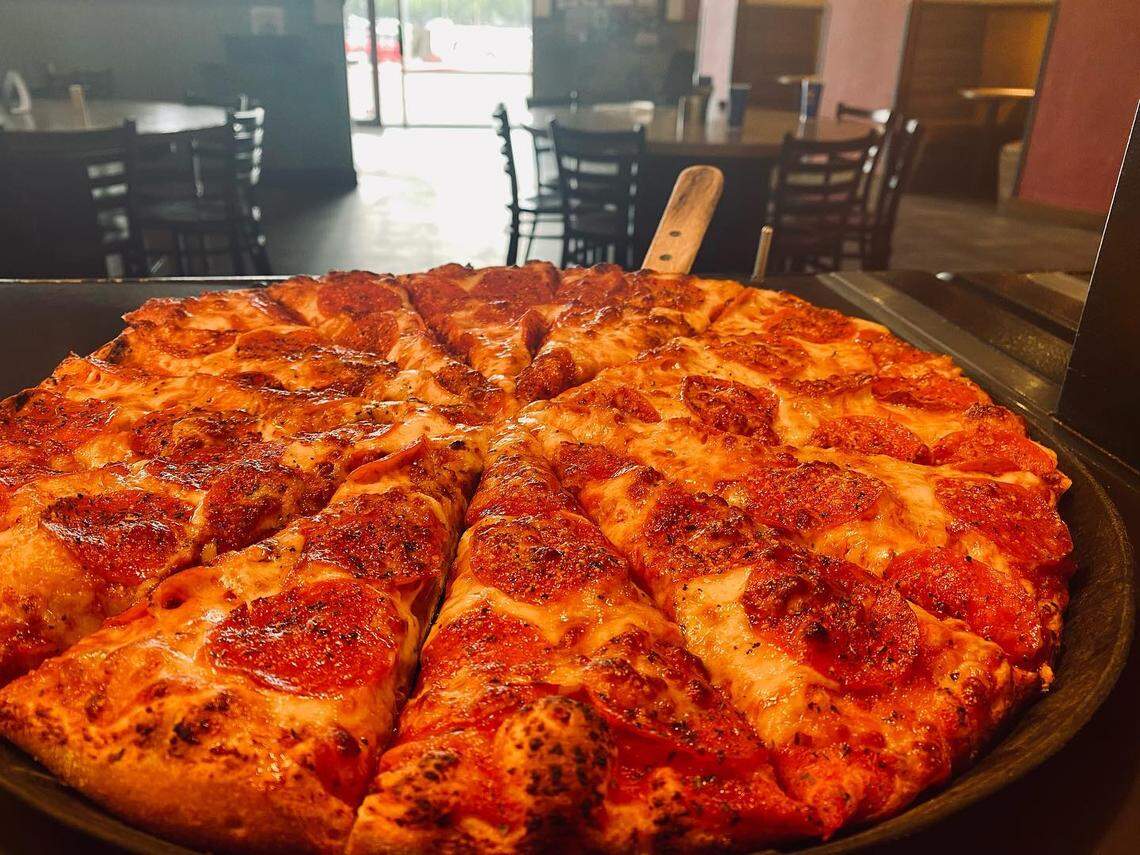 Buffet-style pizza, and lots of it, draws hungry customers.