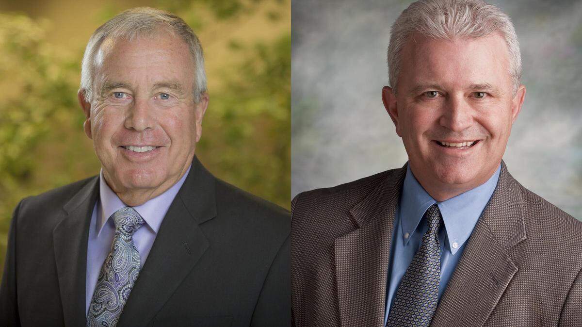 A witness said he saw Boise businessman Bill Ilett, left, strike city official John Brunelle, right, at City Hall.