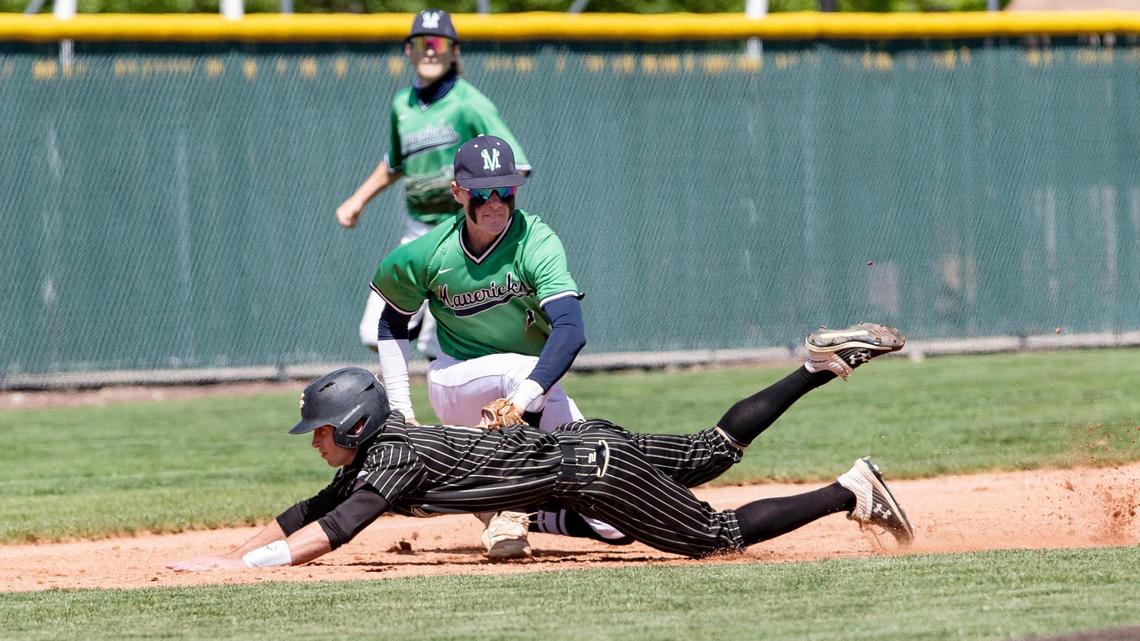 Mountain View’s Logan Burrell tags out Capital’s TJ Collins at third base during the first round of the 5A District Three baseball tournament on Saturday at Mountain View High.