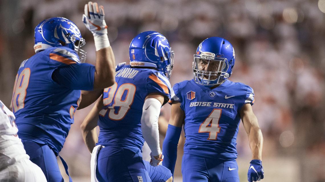 Former Boise State safety DeAndre Pierce (4) celebrates a tackle for loss against UConn in 2021. Pierce ended his college career at Arizona State and joined the Broncos’ recruiting staff last year, but he’ll work out at Boise State Pro Day on March 27.
