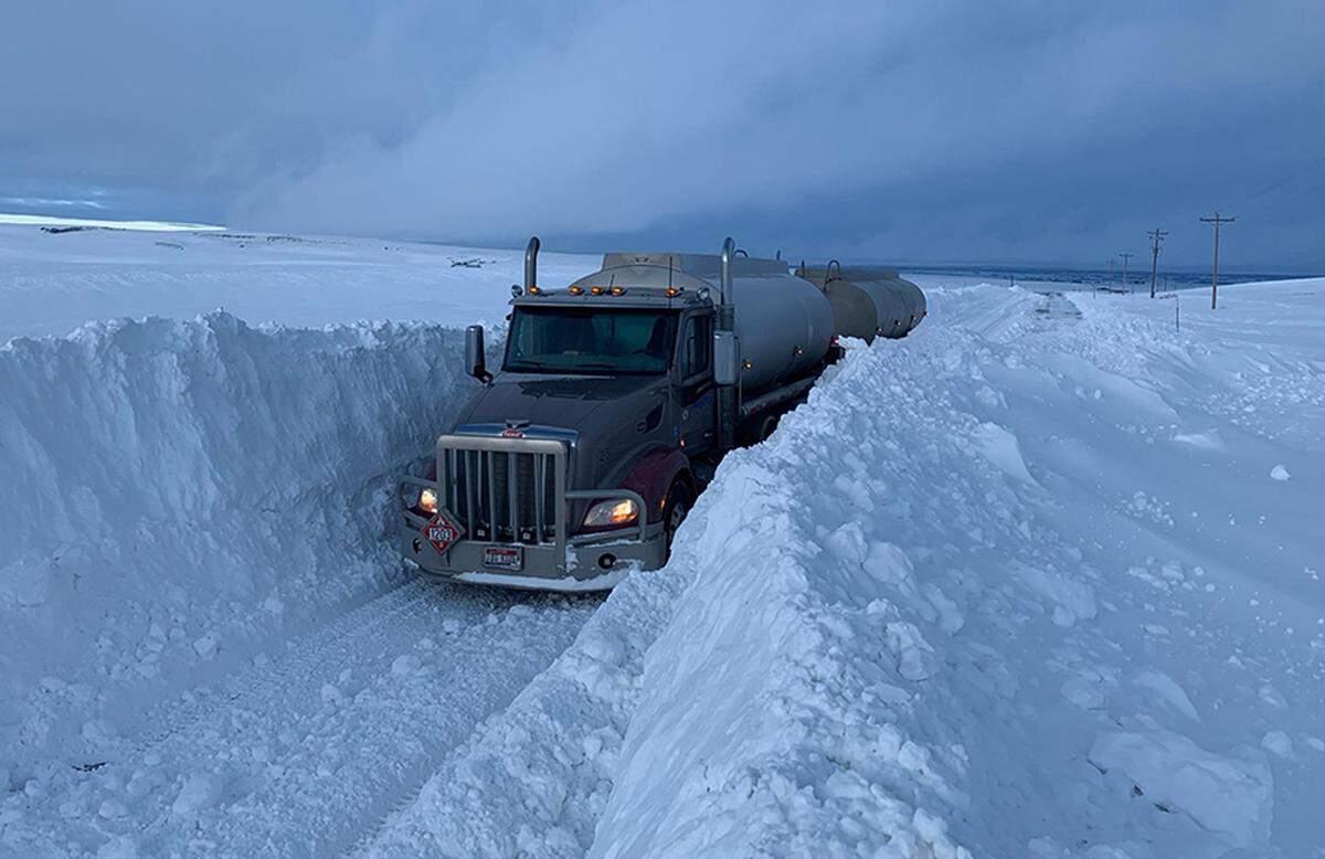 Officials with Idaho Transportation Department helped clear a route on Idaho 33 on Wednesday morning to let Matt Berry, with Berry Oil Fuel, make a much-needed delivery to Tetonia.