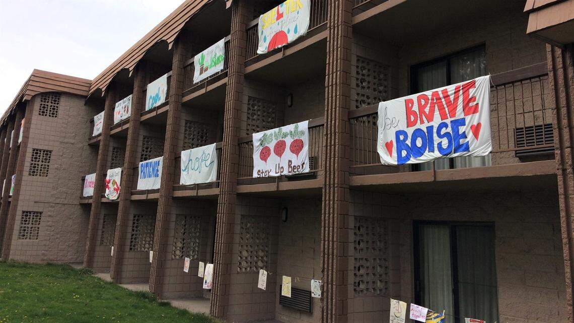 Signs with positive words and messages adorn balconies in April at the Cottonwood Suites Boise Riverside Downtown hotel, on the Greenbelt just north of Fairview Avenue, amid the coronavirus pandemic, when hotels were largely empty. 