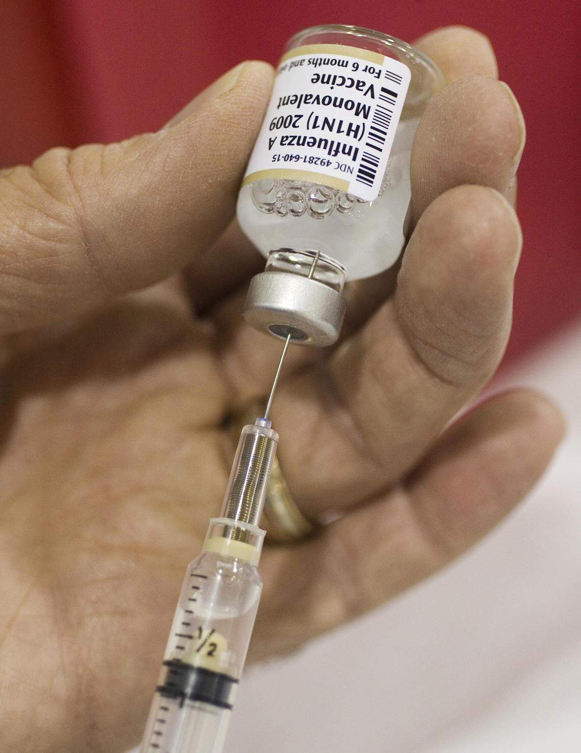Health occupation workers received vaccination shots provided by Central District Health Department in Boise for the H1N1 swine flu virus in this October 2009 Idaho Statesman file photo.