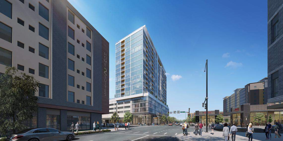 A rendering shows a potential 19-story apartment building at 521 W. Front St. This view, from 6th Street, shows the intersection of 6th and Front streets.