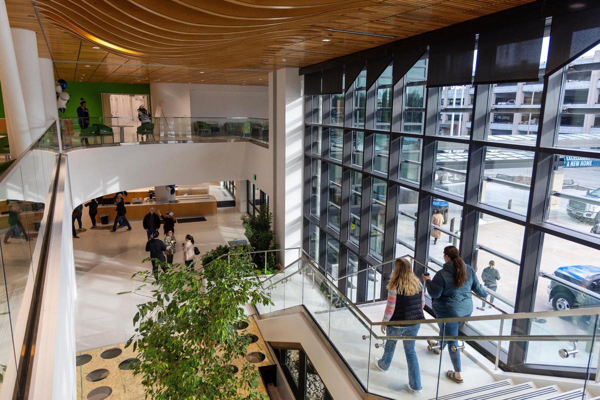 People tour the rehabilitation gym at St. Luke’s Health System’s new Center for Orthopedics and Sports Medicine in Boise.