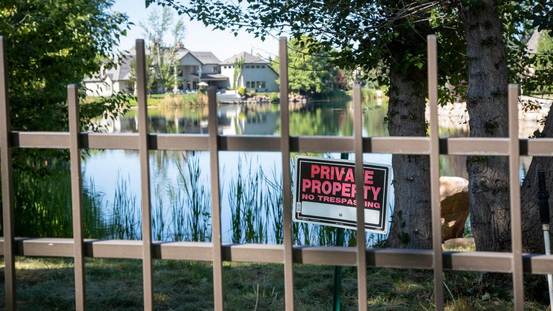A public trail through the Two Rivers subdivision meanders along the back yards of expensive homes and ponds stocked with fish for homeowners’ use only. The Two Rivers Homeowners Association hired a private security firm two years ago to patrol the neighborhoods for trespassers.
