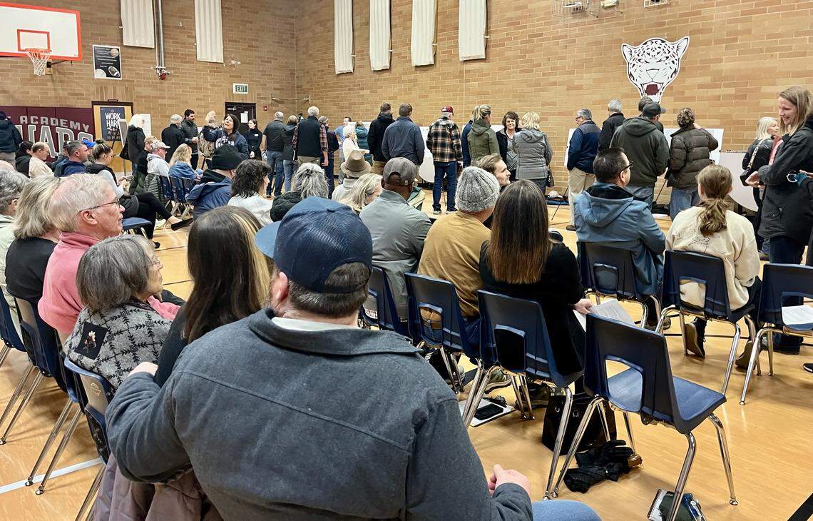 After a few minutes of jeers from residents upset that developers wouldn’t answer questions in a group setting, the neighborhood meeting for the proposed Costco at Idaho 55 and Hill Road got underway.