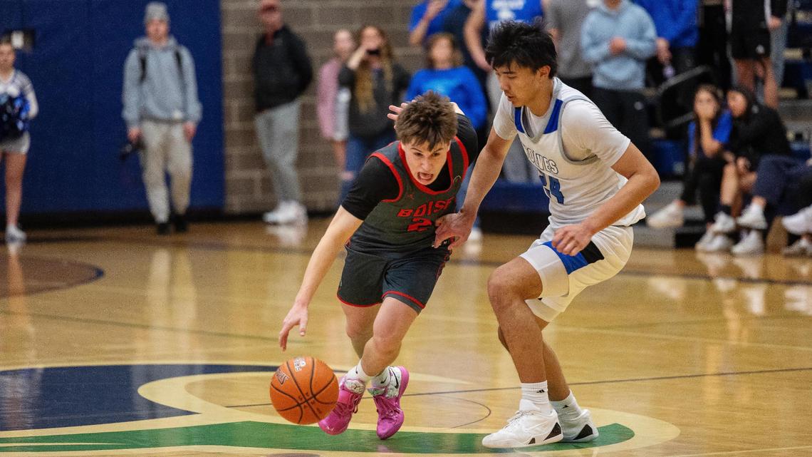 Boise junior Luke Soltau, left, scored five of his 15 points in the decisive second overtime as the Brave knocked off Timberline 66-59 in the first round of the 6A District Three boys basketball tournament Tuesday.