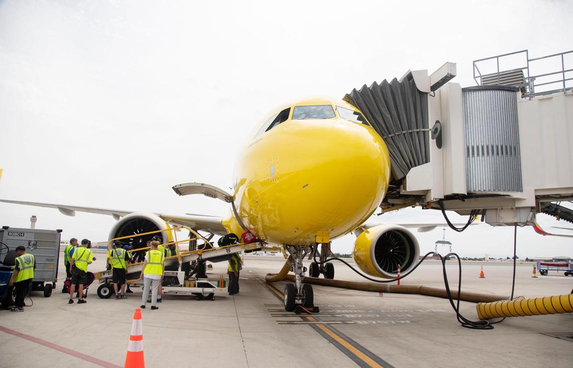 Crews unload luggage from the first Spirit Airlines flight arriving to the Boise Airport from Las Vegas on Friday, Aug. 5, 2022.