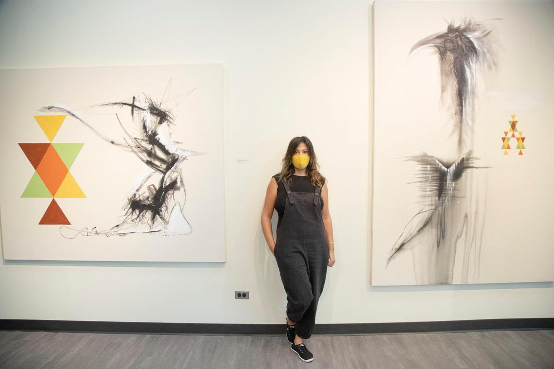 Iraqi-born artist Luma Jasim is pictured with her work in the exhibit Long Term Vision, open from Aug. 22 to Oct. 3 at Boise State’s Student Union Building Fine Arts Gallery.