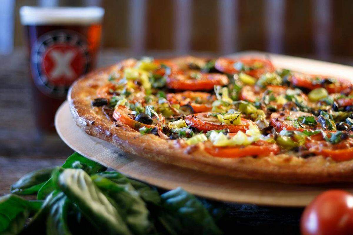 Extreme Pizza offers both freshly baked and take-and-bake pizzas.
