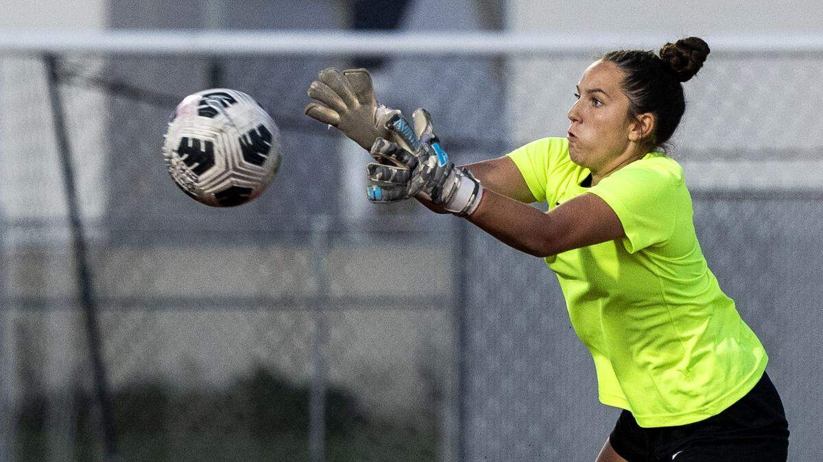 Boise goalkeeper Joee Cromie secures a Mountain View shot at goal during the 6A District Three girls soccer championship at Owyhee High School in Meridian, Wednesday, Oct. 15, 2025.