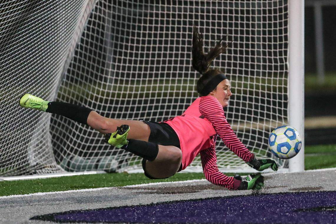 Rocky Mountain goalkeeper Kasey Wardle blocks a potential state title-winning penalty kick during the shootout round of the 5A girls soccer championship Saturday.