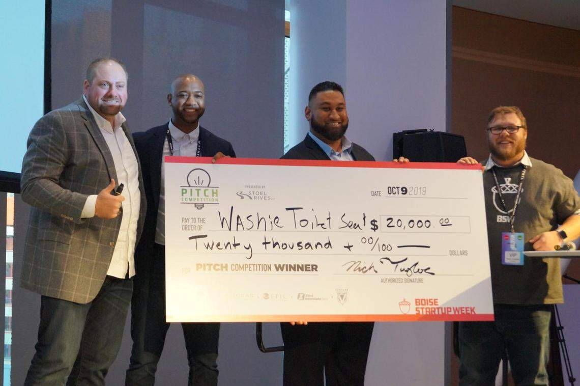 Washie, a Pocatello, Idaho, startup, won the $20,000 first place prize on Oct. 9, 2019, in the annual Pitch Competition at Boise Startup Week. From left are Nick Taylor, an attorney at Stoel Rives LLP in Boise; Dane Simmons, vice president and cofounder of Washie; Rob Poleki, CEO and cofounder of Washie; andNick Crabbs, partner at Vynyl in Boise and co-chairman of Boise Startup Week.