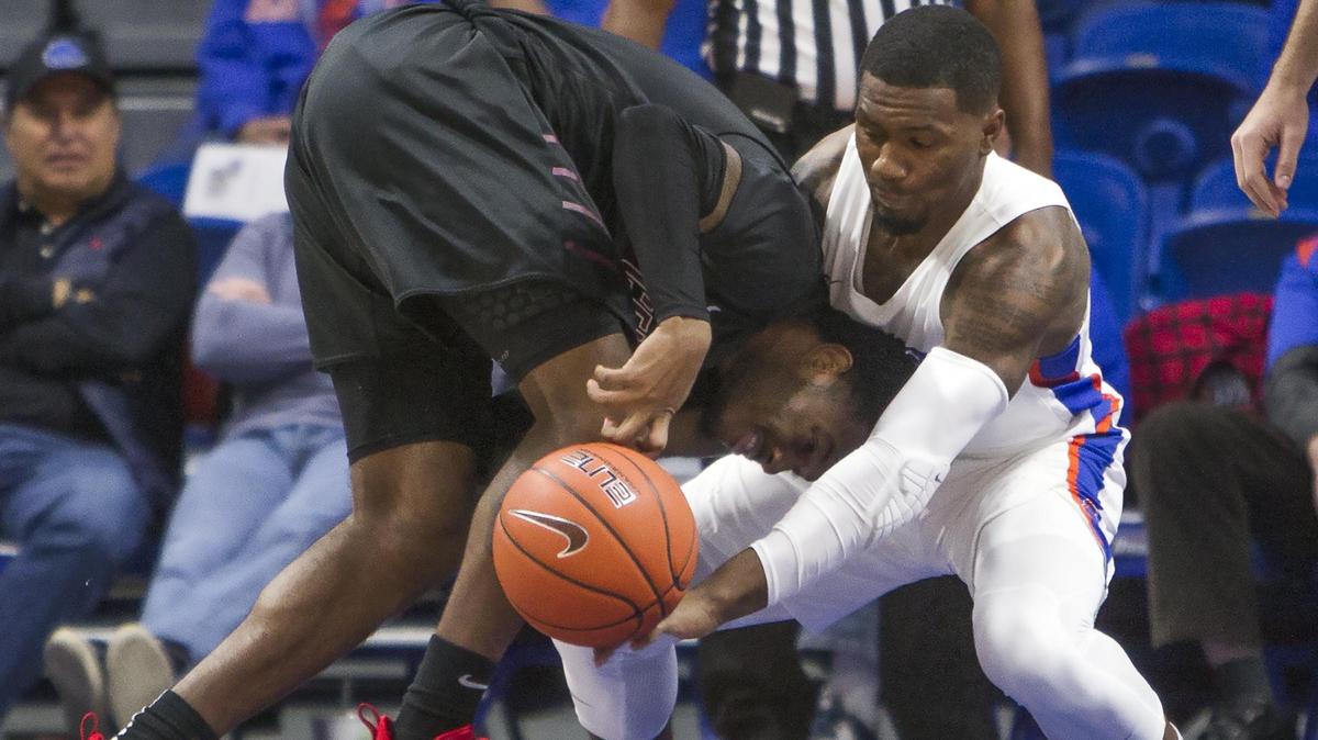 Boise State guard Marcus Dickinson forces a turnover by Central Washington’s Gamaun Boykin in the first half Saturday, Dec. 8, 2018 at Taco Bell Arena in Boise.