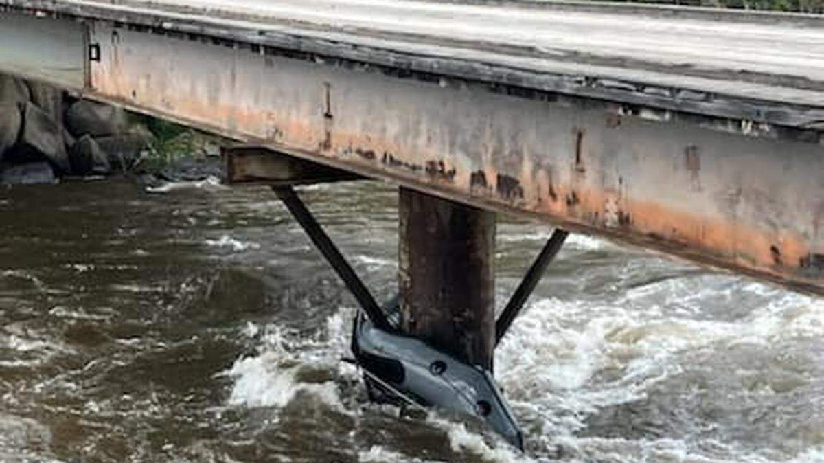 A woman remains missing after rescuers pulled two adults and a child from the Stillwater River in Columbus after their raft capsized, Montana officials say.
