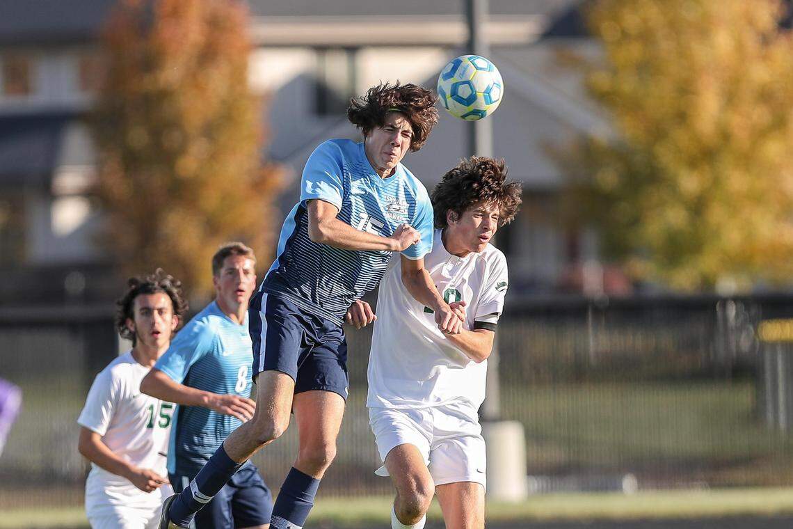 Skyview’s Jordan Skyes, center, was voted the 5A boys soccer player of the year by the state’s coaches.