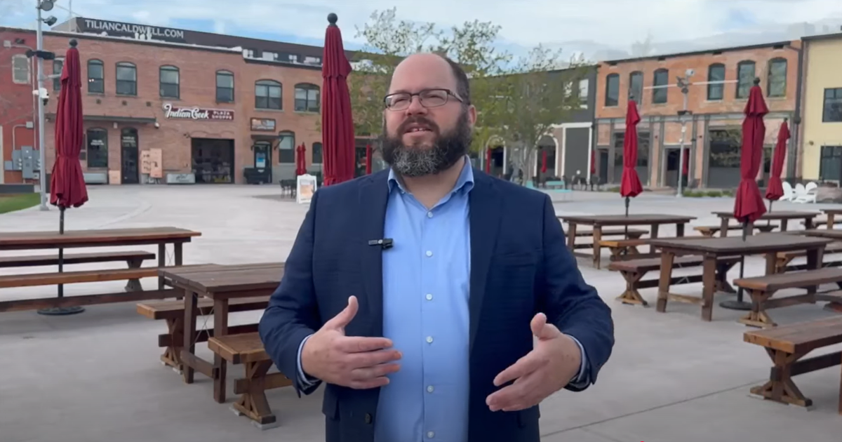 Caldwell, Idaho, lawyer Brian Festa in April 2025 at Indian Creek Plaza discussing a landlord’s decision not to renew the lease of University of Idaho student Michael Leggett, of Murrieta, California, after Leggett hung an “All Aboard the Trump Train 2024” flag in his apartment in Moscow. Festa is cofounder and vice president of We the Patriots USA Inc., a nonprofit formed to provide free legal representation involving conservative causes such as health freedom and 2nd Amendment rights.