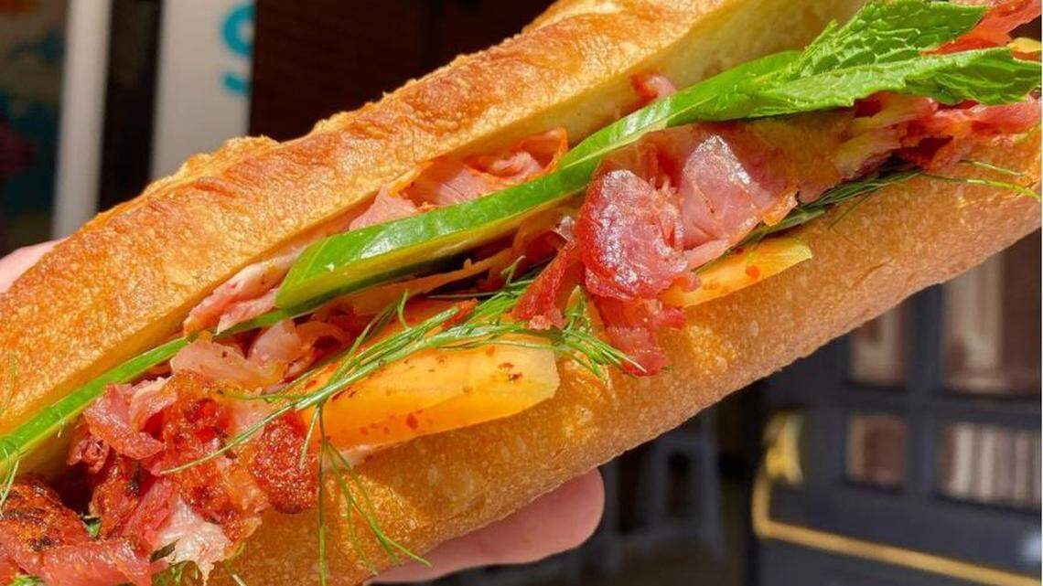 Crispy curry-cured ham, fresh melon, cucumber, cashew butter and “tons of herbage” were piled on this sandwich.