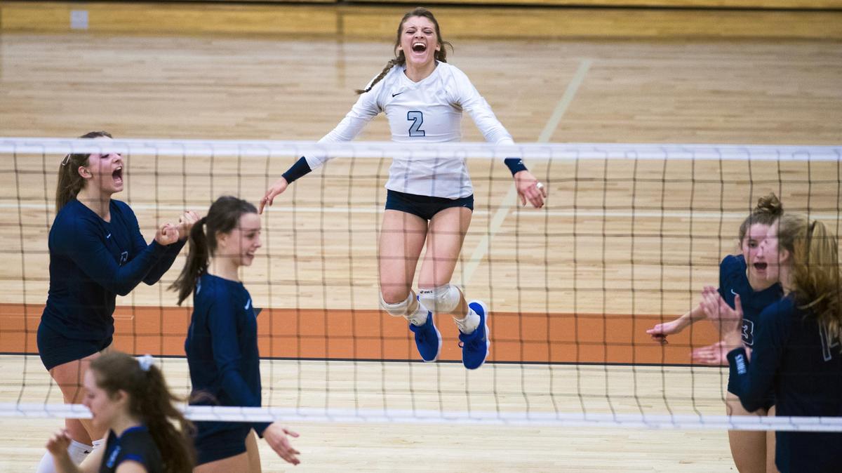 Skyview senior Morgan Bower celebrates a hard-fought point in the Hawks’ first-round win over Coeur d’Alene in the 5A volleyball state tournament Friday at Ridgevue High School in Nampa.