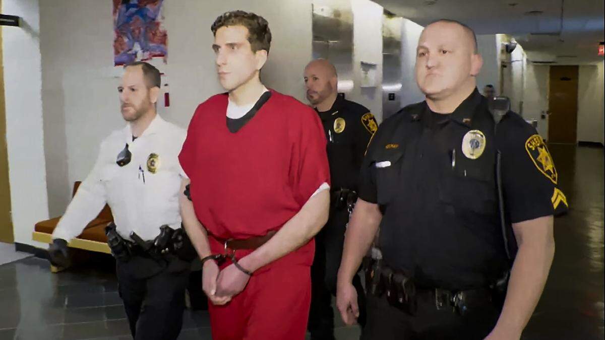 Bryan C. Kohberger is led to a courtroom in Pennsylvania for an extradition hearing to be moved to Idaho as a suspect in the stabbing deaths of four University of Idaho students.