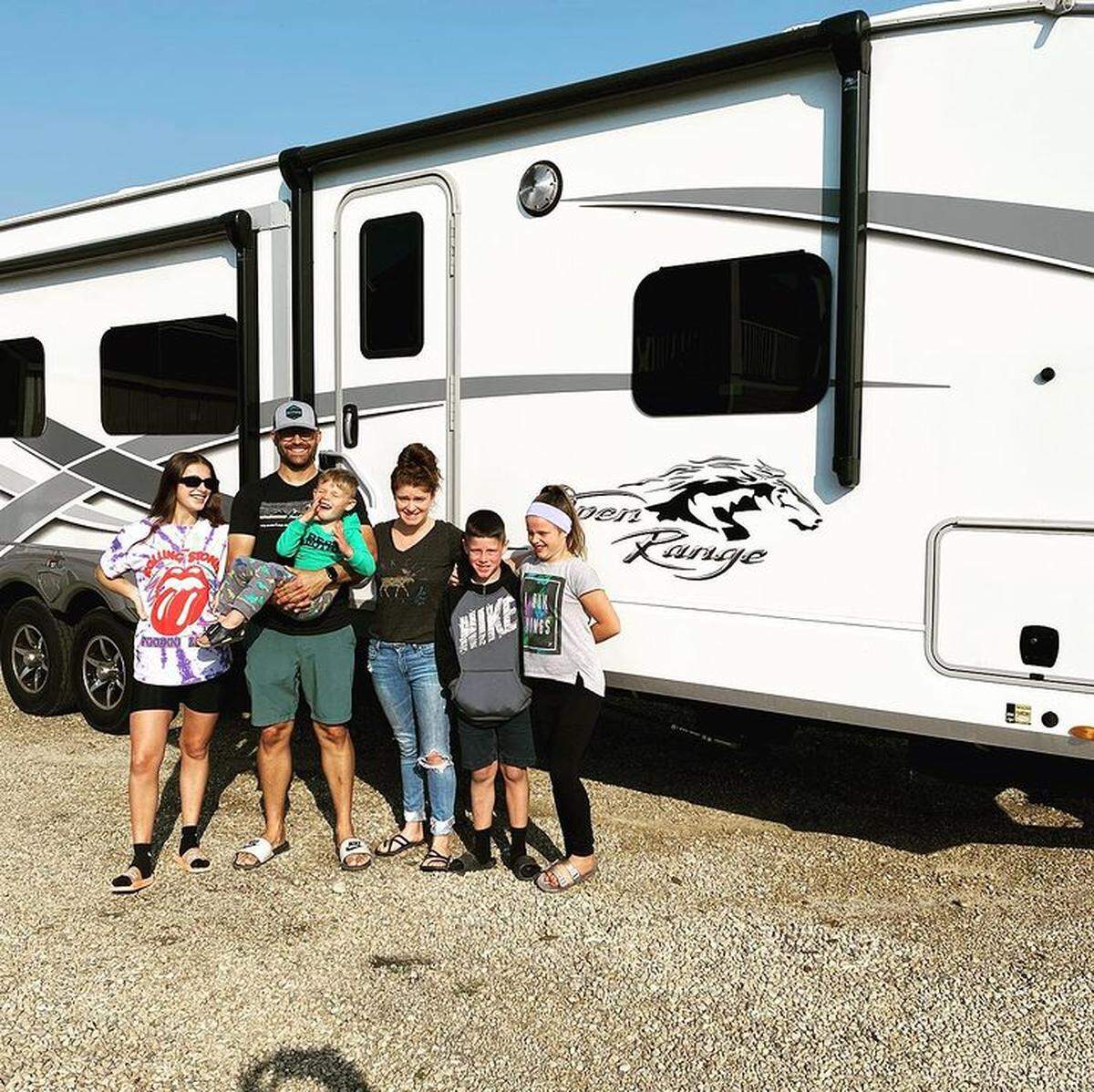 The Morse family of Meridian, Idaho, is traveling the U.S. for a year in their RV. From left: Jadyn, 15; Brandon holding 3-year-old Koen; Amber, and 10-year-old twins Hudson and Brittan.