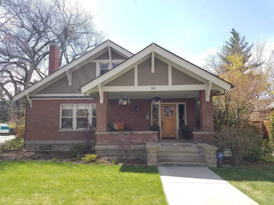 This restored craftsman home is on a corner lot.