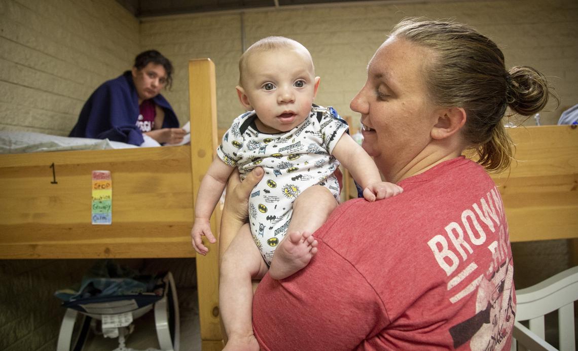 While her husband works, Jessica Juntila cares for their four children at the shelter, including 18-month-old William. Sofia, 12, on the bunk, is in sixth grade.
