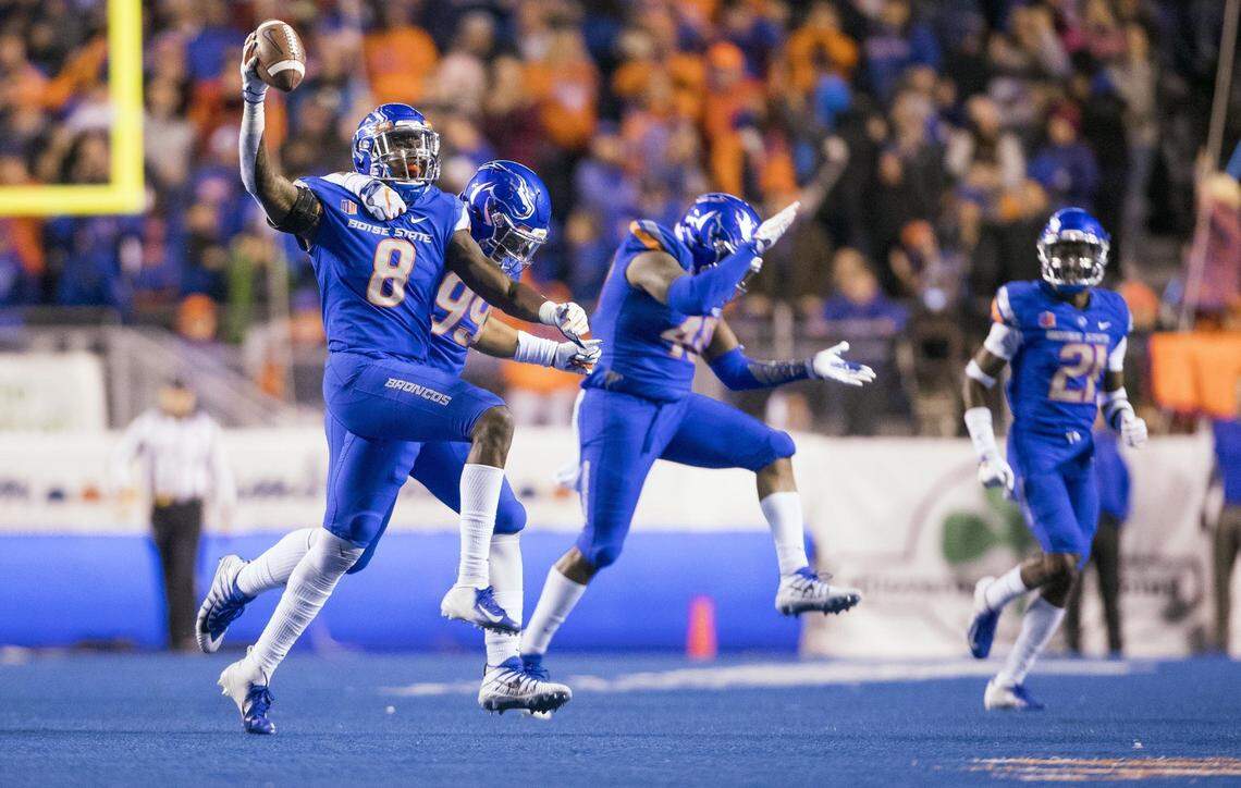 Boise State linebacker Jabril Frazier (8) celebrates recovering a BYU fumble late in 2018 at Albertsons Stadium.