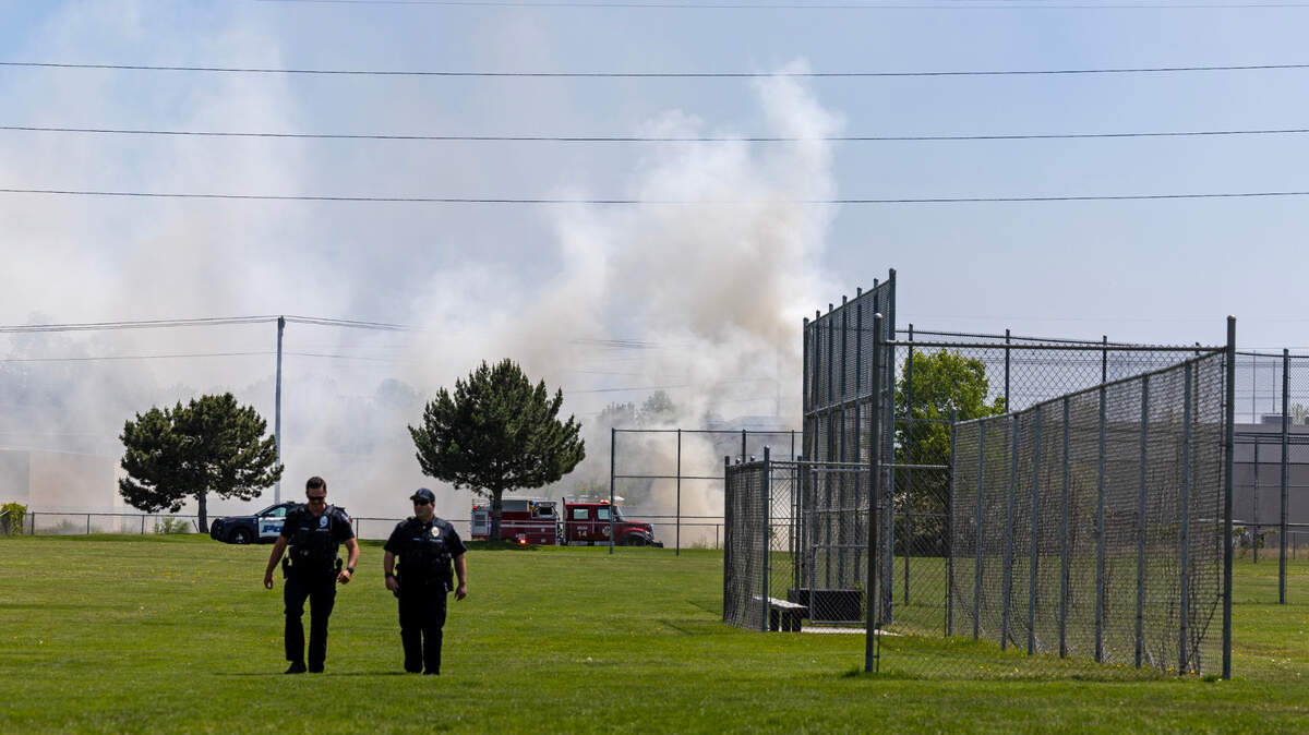 The ignited railroad ties were sending a good amount of smoke into the surrounding area.