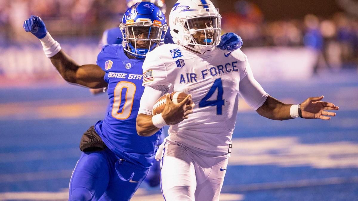 Air Force quarterback Haaziq Daniels breaks away from Boise State safety JL Skinner on a 25-yard touchdown run during the teams’ last meeting — a 24-17 Air Force win at Albertsons Stadium in Boise.