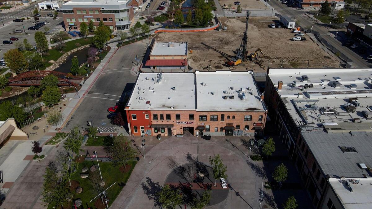 Indian Creek Plaza is shown on the lower half of the photo. The upper half shows the construction on Creekside, a 142-apartment project.