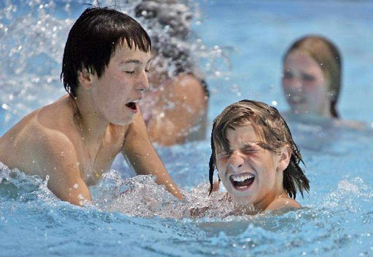 Swimmers splash at Natatorium Pool in Boise.