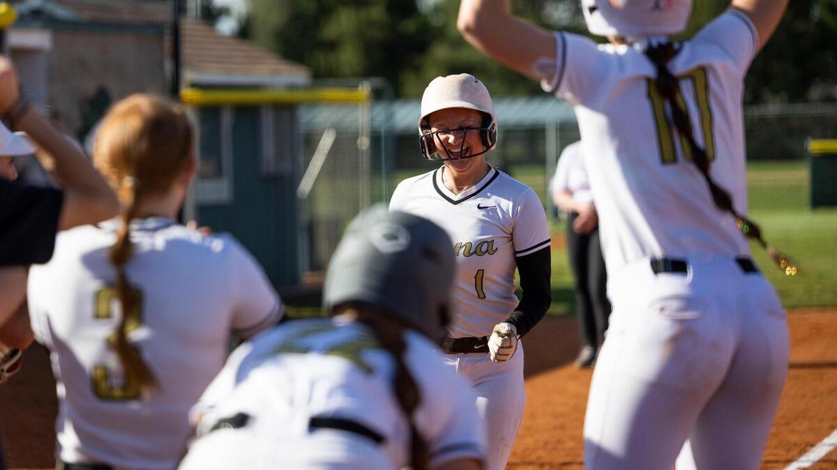 Kuna senior Brylin Field, center, was one of three Kavemen voted to the 5A SIC all-conference first team by the league’s softball coaches.