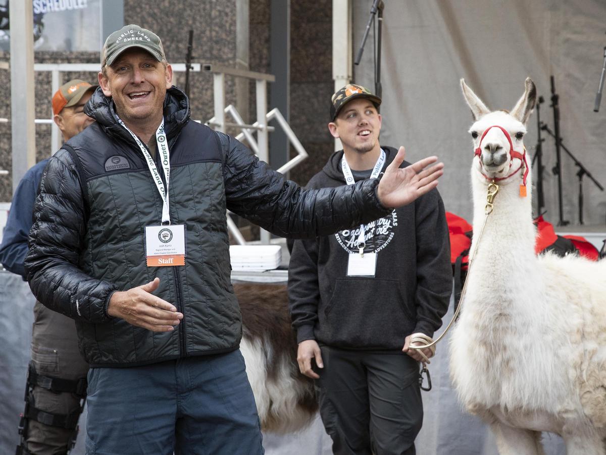 Josh Kuntz with the Idaho Backcountry Hunters and Anglers (BHA) Chapter, introduces a demonstration on pack llamas Saturday morning during the BHA Rendezvous in Downtown Boise.